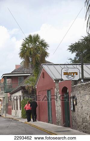 Usa, Florida, Couple Passing Restaurant; St Augustine View Large Photo Image Stock Image - Usa, Florida, Couple Passing Restaurant; St Augustine. Fotosearch