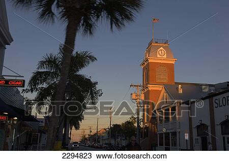 Stock Image - USA, Florida, Florida Keys, Old City Hall clock tower; Key West. Fotosearch