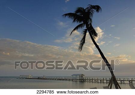 USA, Florida, Florida Keys, Sunrise over pier and boat dock; Islamorada View Large Photo Image Stock Photography - USA, Florida, Florida Keys, Sunrise over pier and boat dock; Islamorada. Fotosearch