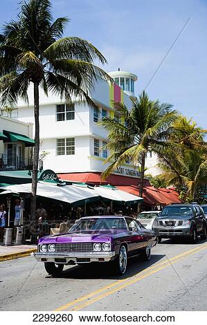 USA., Florida, Miami, Ocean Drive; South Beach, bright purple colored 70s Chevrolet muscle car, All american View Large Photo Image Stock Image - USA., Florida, Miami, Ocean Drive; South Beach, bright purple colored 70s Chevrolet muscle car, All american. Fotosearch