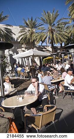 Stock Photography - Usa, Florida, People In Outdoor Cafeteria; Miami. Fotosearch