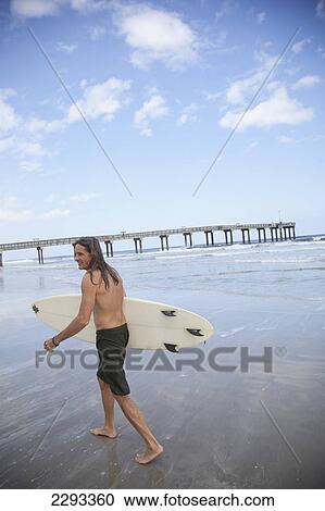 Usa, Florida, Surfer Walking Towards Sea; St Augustine View Large Photo Image Stock Image - Usa, Florida, Surfer Walking Towards Sea; St Augustine. Fotosearch