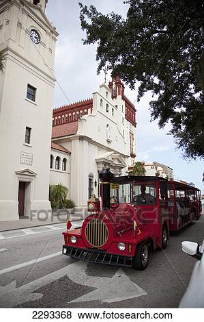 Stock Photo - Usa, Florida, Tourist Trolley On Street; St Augustine. Fotosearch