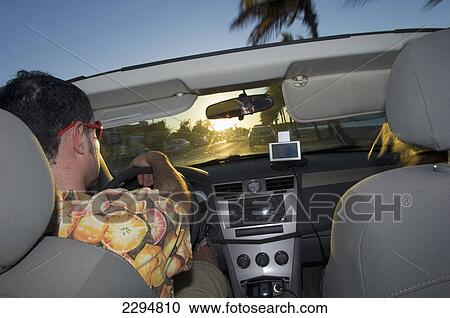 USA, Florida, Young couple on holiday driving along Highway 1 in cabriolet; Florida Keys View Large Photo Image Stock Image - USA, Florida, Young couple on holiday driving along Highway 1 in cabriolet; Florida Keys. Fotosearch
