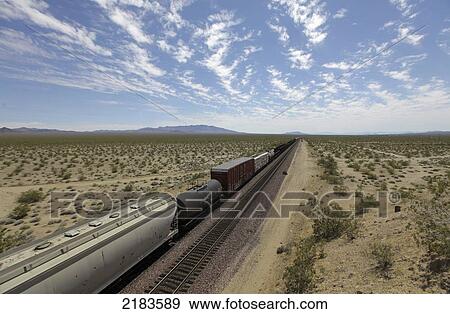 Usa, Freight Train Moves Through Desert Next To Route 66; California View Large Photo Image Stock Photo - Usa, Freight Train Moves Through Desert Next To Route 66; California. Fotosearch