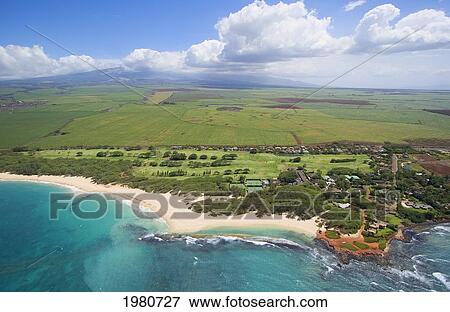 Stock Photo - USA, Hawaii, Aerial view of Baldwin Beach and Maui Country Club along North Coast; Maui. Fotosearch