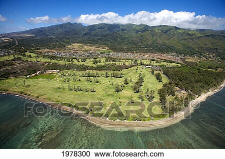 Stock Image - USA, Hawaii, Aerial view of Golf Course and coastline; Waiehu. Fotosearch