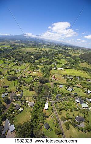 Stock Photo - USA, Hawaii, Aerial view of Huelo looking towards Haleakala; Maui. Fotosearch