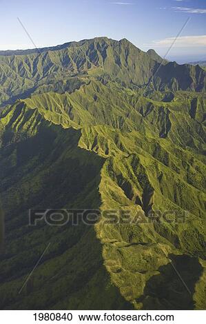 Stock Image - USA, Hawaii, Aerial view of mountains; Kauai. Fotosearch