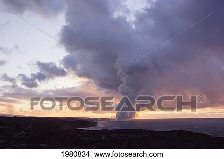 USA, Hawaii, Big Island, Steam cloud from lava entering Pacific Ocean from Kilauea at sunset; Kalapana View Large Photo Image Picture - USA, Hawaii, Big Island, Steam cloud from lava entering Pacific Ocean from Kilauea at sunset; Kalapana. Fotosearch