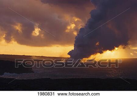 USA, Hawaii, Big Island, Steam cloud from lava entering Pacific Ocean from Kilauea at sunset; Kalapana View Large Photo Image Stock Image - USA, Hawaii, Big Island, Steam cloud from lava entering Pacific Ocean from Kilauea at sunset; Kalapana. Fotosearch