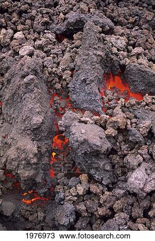 Stock Image - USA, Hawaii, Big Island, USA Volcanoes National Park; Kilauea, Hawaii, East Rift Zone, Close-Up Of Lava Flow Under Rocks. Fotosearch
