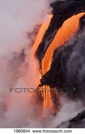Picture - USA, Hawaii, Big Island, View of Pahoehoe lava flowing into Pacific Ocean; Kalapana. Fotosearch