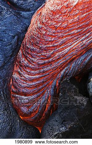 Stock Photo - USA, Hawaii, Close up of molten Pahoehoe lava from Kilauea Volcano in Hawaii Volcanoes National Park; Big Island. Fotosearch