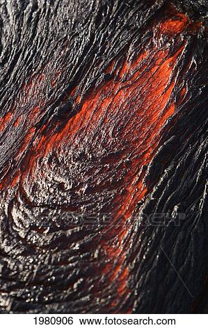Stock Photograph - USA, Hawaii, Close up of molten Pahoehoe lava from Kilauea Volcano in Hawaii Volcanoes National Park; Big Island. Fotosearch