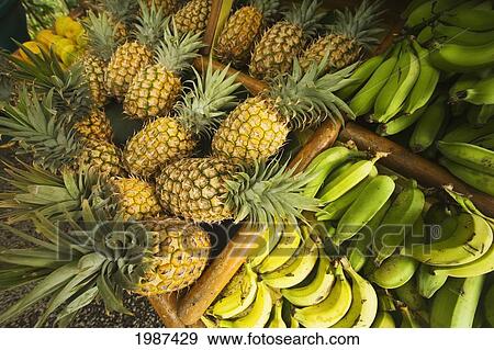 Stock Photo - USA, Hawaii, Fruit stand at Huelo along Hana Highway; Maui. Fotosearch