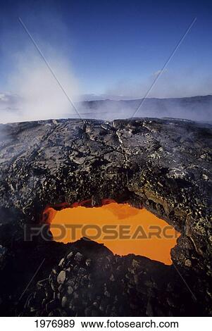 USA, Hawaii, Hawaii Volcanoes National Park; Big Island, East Rift Zone, Opening To Active Lava Tube Showing Orange Glow View Large Photo Image Stock Photo - USA, Hawaii, Hawaii Volcanoes National Park; Big Island, East Rift Zone, Opening To Active Lava Tube Showing Orange Glow. Fotosearch