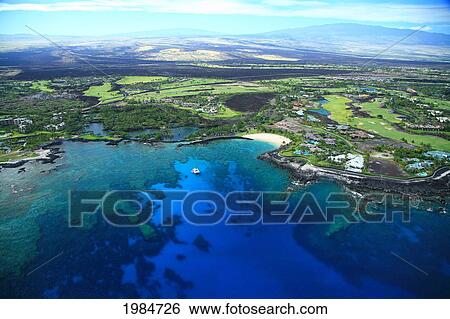 Stock Photograph - USA, Hawaii Island, Big Island, Aerial view of Mauna Lani Resort; Kohala Coast. Fotosearch