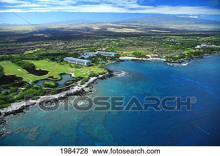 Stock Photo - USA, Hawaii Islands, Big Island, Kohala Coast, Aerial view of Fairmont Orchid; Mauna Lani. Fotosearch