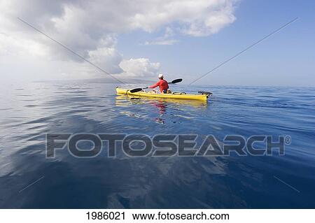 USA, Hawaii Islands, Man in yellow kayak on calm ocean of southern coast; Maui View Large Photo Image Stock Image - USA, Hawaii Islands, Man in yellow kayak on calm ocean of southern coast; Maui. Fotosearch