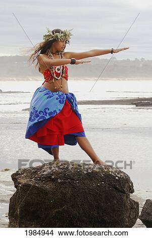 USA, Hawaii Islands, Maui, Beautiful Hawaiian girl dancing hula on rock overlooking ocean; La Perouse Bay View Large Photo Image Picture - USA, Hawaii Islands, Maui, Beautiful Hawaiian girl dancing hula on rock overlooking ocean; La Perouse Bay. Fotosearch