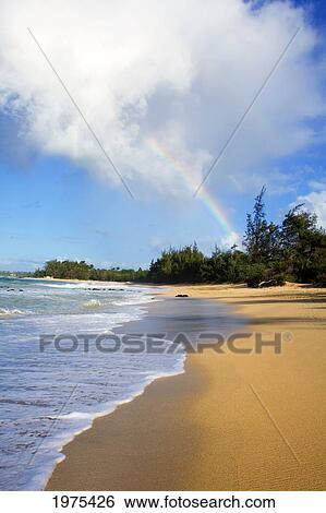 Stock Photograph - USA, Hawaii Islands, Maui, Rainbow; Baldwin Beach. Fotosearch