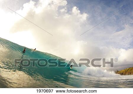 USA, Hawaii Islands, Maui, Surfers On Large Wave Getting Barreled; Honolua Bay View Large Photo Image Stock Photo - USA, Hawaii Islands, Maui, Surfers On Large Wave Getting Barreled; Honolua Bay. Fotosearch