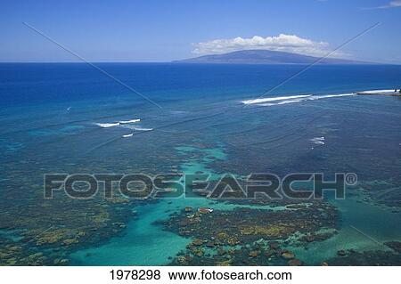 Stock Photo - USA, Hawaii, Lanai in distance; Maui, Reef Off Olowalu. Fotosearch