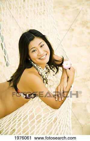USA, Hawaii, Makena, Woman relaxing In Hammock; Lanikai View Large Photo Image Stock Image - USA, Hawaii, Makena, Woman relaxing In Hammock; Lanikai. Fotosearch