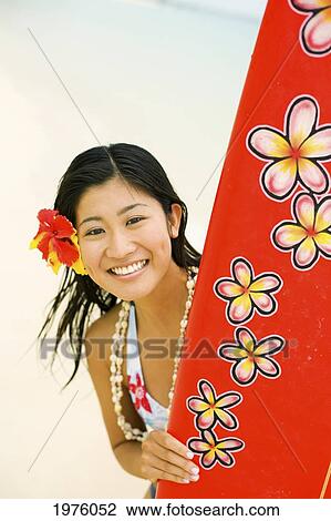 USA, Hawaii, Makena, Young Woman Holding Surfboard; Lanikai View Large Photo Image Stock Image - USA, Hawaii, Makena, Young Woman Holding Surfboard; Lanikai. Fotosearch