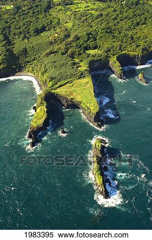 Stock Photography - USA, Hawaii, Maui, Aerial of rugged coast; North Coast. Fotosearch