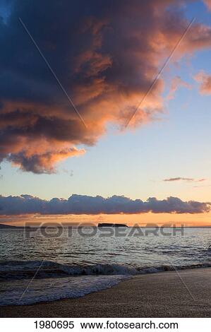 Stock Photography - USA, Hawaii, Maui, Molokini in background; Makena State Park, Oneloa Or Big Beach at sunset. Fotosearch