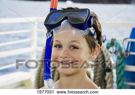 USA, Hawaii, Maui, Smiling Young Boy Prepares To Go Snorkeling; Lanai View Large Photo Image Stock Image - USA, Hawaii, Maui, Smiling Young Boy Prepares To Go Snorkeling; Lanai. Fotosearch