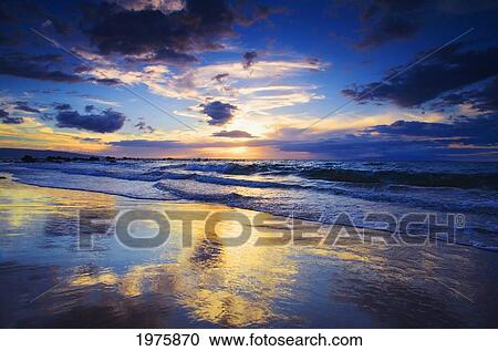 Stock Image - USA, Hawaii, Maui, Sunset At Mokapu Beach; Wailea. Fotosearch