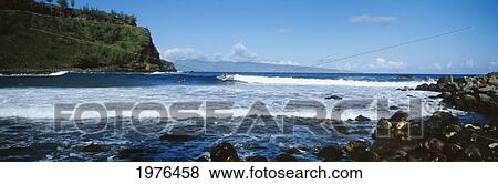 Stock Photo - USA, Hawaii, Maui, Surfers On Waves Close To Shore; Honokahau Coast. Fotosearch