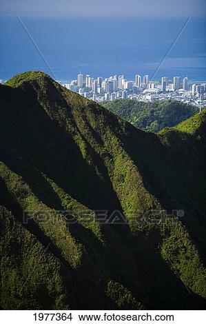Picture - USA, Hawaii, Oahu, Aerial view of city overlooking Koolau Mountains; Honolulu. Fotosearch