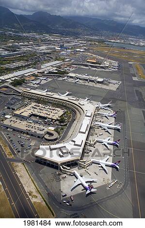 USA, Hawaii, Oahu, Aerial view of airplanes in Honolulu International Airport; Honolulu View Large Photo Image Picture - USA, Hawaii, Oahu, Aerial view of airplanes in Honolulu International Airport; Honolulu. Fotosearch