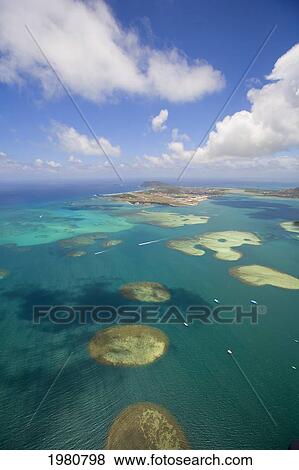 Stock Photo - USA, Hawaii, Oahu, Aerial view of sandbar patches in Kaneohe Bay; Windward Coast. Fotosearch