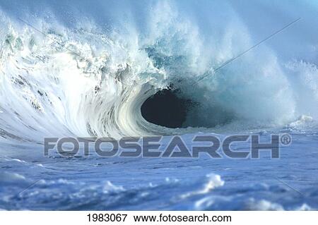 Stock Photo - USA, Hawaii, Oahu, Crashing whitewater wave curls; North Shore. Fotosearch
