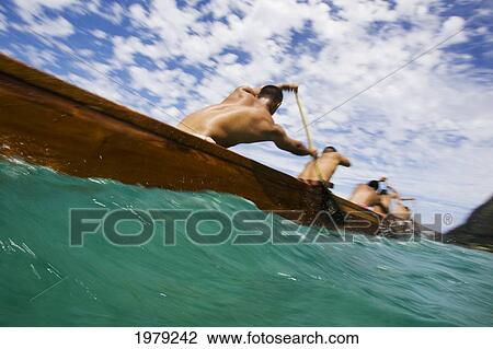 USA, Hawaii, Oahu, Male canoe team paddling through Pacific Ocean; Waimanalo View Large Photo Image Stock Image - USA, Hawaii, Oahu, Male canoe team paddling through Pacific Ocean; Waimanalo. Fotosearch
