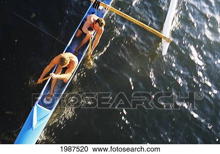 USA, Hawaii, Oahu, Men paddling outrigger canoe; Ala Wai Canal View Large Photo Image Stock Image - USA, Hawaii, Oahu, Men paddling outrigger canoe; Ala Wai Canal. Fotosearch