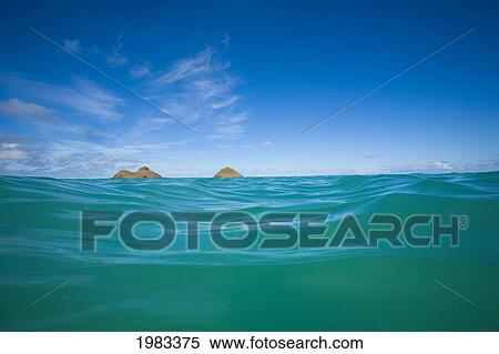 USA, Hawaii, Oahu, Pacific ocean with Mokulua island in background; Lanikai View Large Photo Image Stock Photography - USA, Hawaii, Oahu, Pacific ocean with Mokulua island in background; Lanikai. Fotosearch