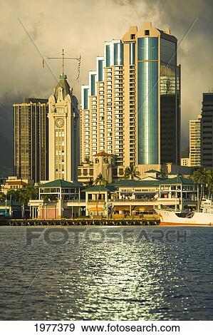 Stock Photo - USA, Hawaii, Oahu, View of downtown and harbor; Honolulu. Fotosearch
