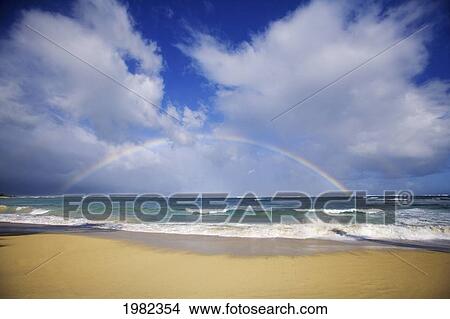 USA, Hawaii, Rainbow at Baldwin Beach; Maui View Large Photo Image Picture - USA, Hawaii, Rainbow at Baldwin Beach; Maui. Fotosearch