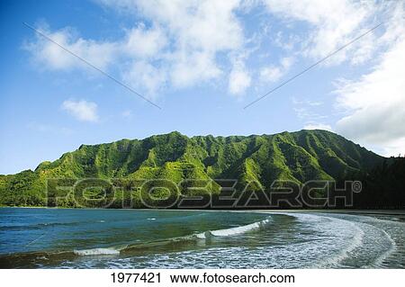 Stock Image - USA, Hawaii, Scenic view of Kahana Bay; Oahu. Fotosearch