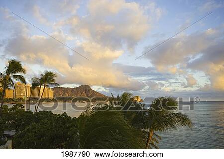 Stock Image - USA, Hawaii, Waikiki Beach and Diamond Head in afternoon seen from Sheraton Waikiki; Oahu. Fotosearch