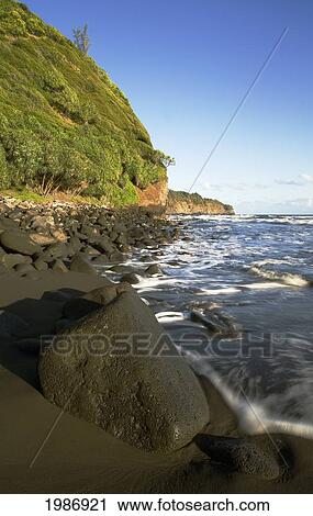 Stock Image - USA, Hawaiian Islands, Big Island, North Kohala, Black Sand Beach; Pololu. Fotosearch