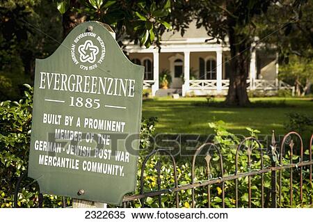USA, Louisiana, 19th century cottage; St Francisville, Sign in Evergreenzine View Large Photo Image Stock Photography - USA, Louisiana, 19th century cottage; St Francisville, Sign in Evergreenzine. Fotosearch