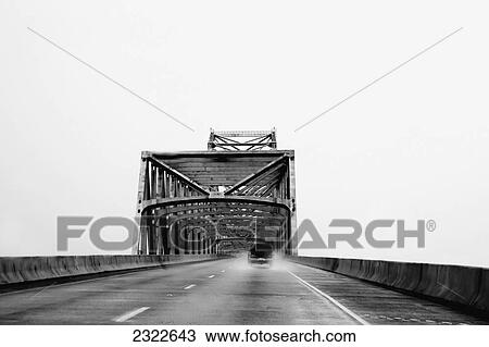 Stock Image - USA, Louisiana, Bridge over Mississippi river; Vacherie. Fotosearch