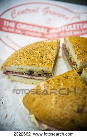 Stock Image - USA, Louisiana, French Quarter; New Orleans, Traditional muffuletta. Fotosearch